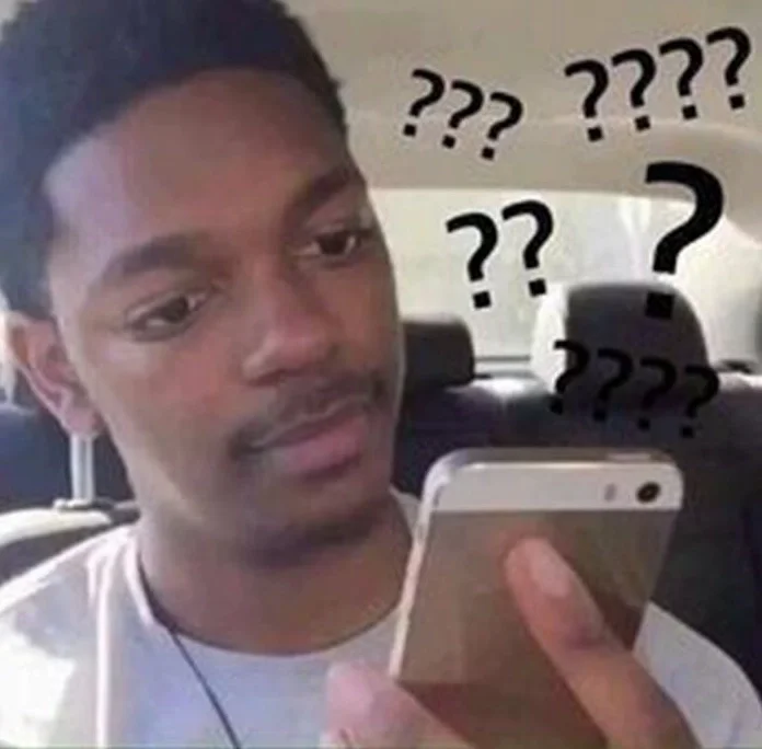 Meme khó hiểu về một người đàn ông đang tỏ ra cực kỳ bối rối khi xem điện thoại