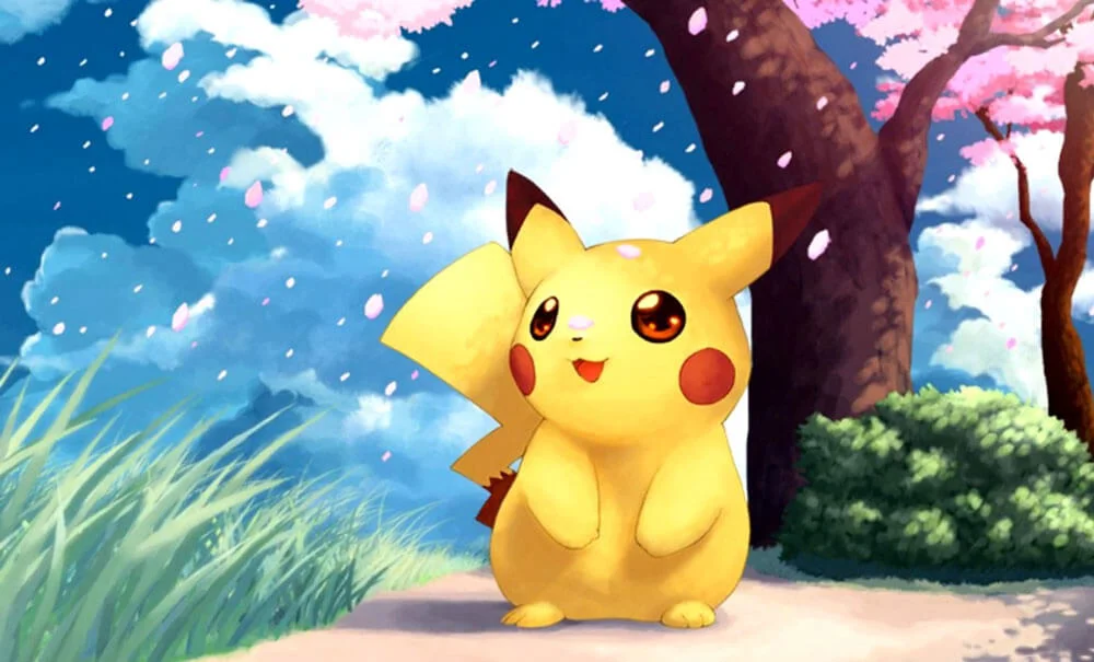 Hình nền máy tính cute với Pikachu đáng yêu đứng giữa khung cảnh hoa anh đào, bầu trời xanh và cỏ xanh