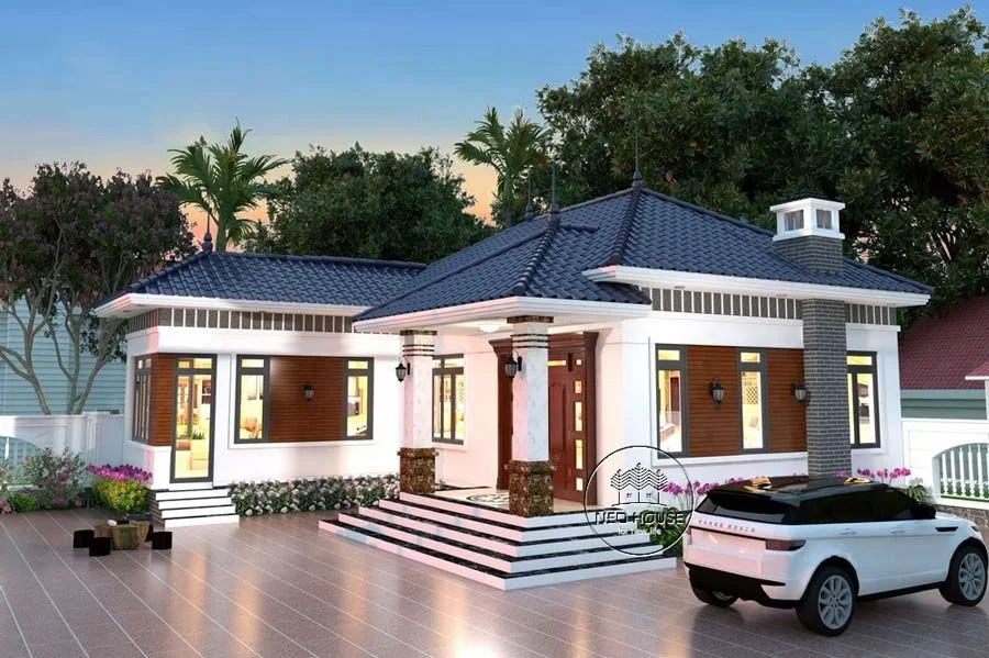 Mẫu nhà cấp 4 hiện đại chữ L, mái Nhật và sân trước lát gạch rộng
